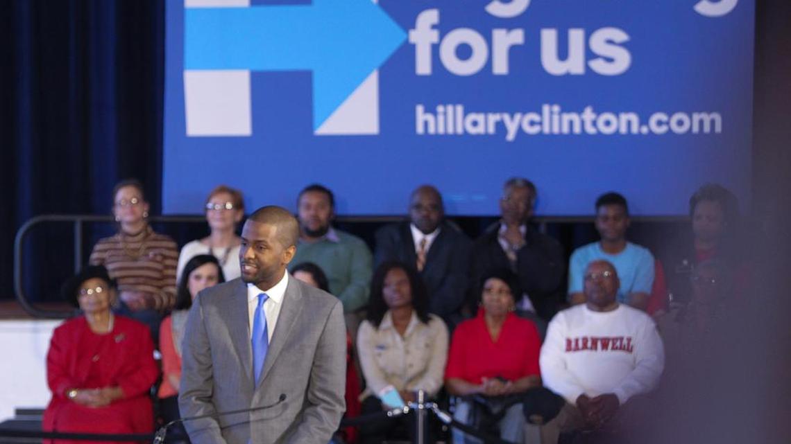Bakari Sellers introduces Democratic presidential candidate Hillary Clinton at Denmark-Olar Elementary School earlier this month during a campaign stop.