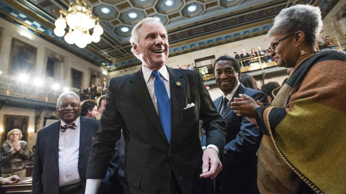 South Carolina Governor Henry McMaster greets lawmakers, including Rep. Wendy Brawley, D-Richland, right, before delivering the State of the State address at the South Carolina Statehouse, Wednesday, Jan. 23, 2019, in Columbia, S.C. (AP Photo/Sean Rayford)