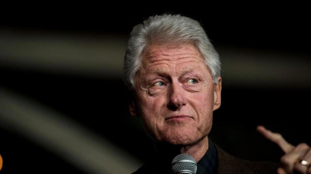 Former President Bill Clinton introduces his wife former Secretary of State Hillary Clinton at The Col Ballroom campaign event in Davenport, Iowa on Friday evening, January 29, 2016.