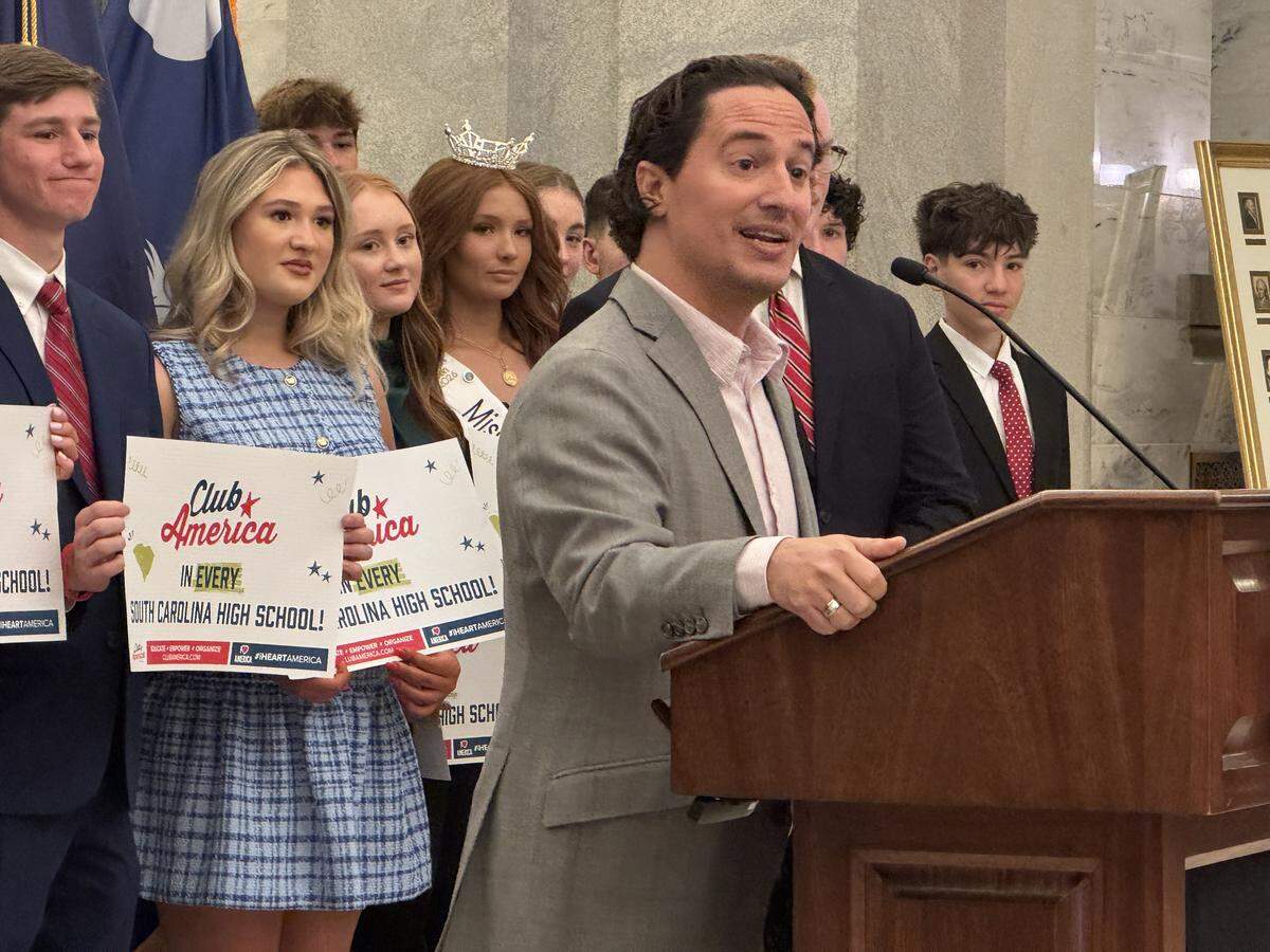Turning Point USA’s Chief Field Officer Andrew Sypher speaks at a news conference Friday, April 10, 2026, at the South Carolina State House to promote the group’s push to have Club America in every high school.