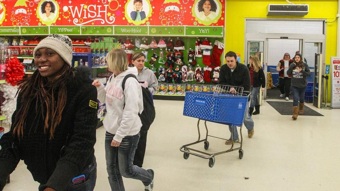 Black Friday shoppers search for items on sale at the Toys R Us in Harbison.