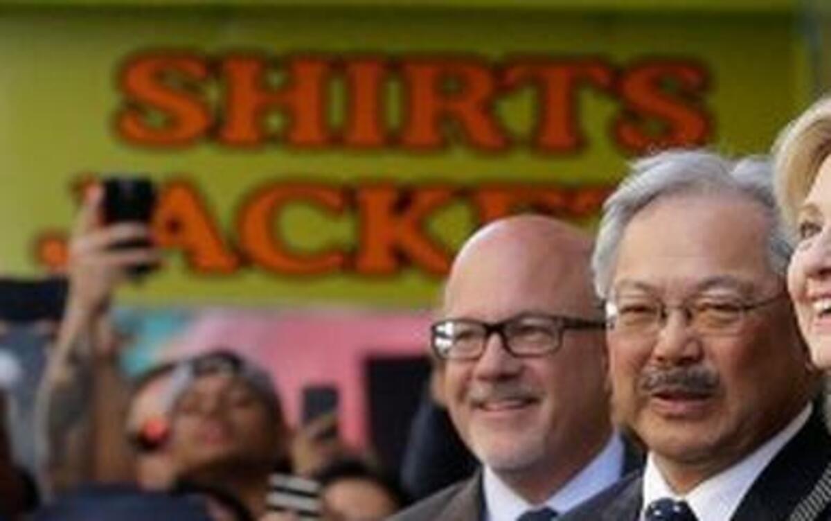 
Democratic presidential candidate Hillary Rodham Clinton, right, stands next to San Francisco Mayor Ed Lee after visiting Red Blossom Tea Company in Chinatown in San Francisco, Wednesday, May 6, 2015.
