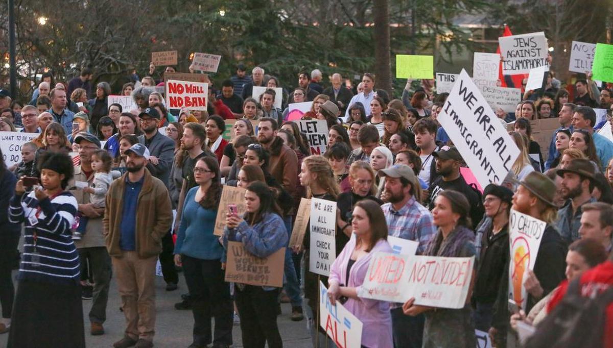 FILE: Hundreds of people brought their message against President Trump’s executive order temporarily banning some immigrants from entering the United States during a demonstration at the South Carolina State House on Tuesday, Jan. 31, 2017.