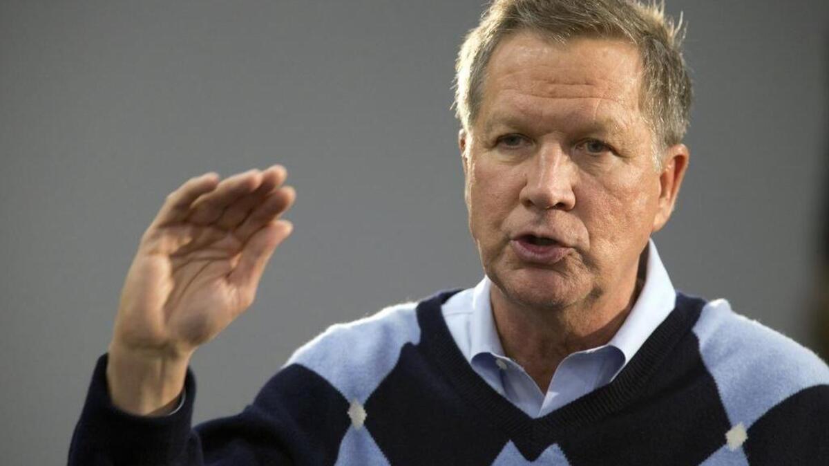 In this Jan. 27, 2016, photo, Republican presidential candidate, Ohio Gov. John Kasich speaks during a town hall meeting in Davenport, Iowa.