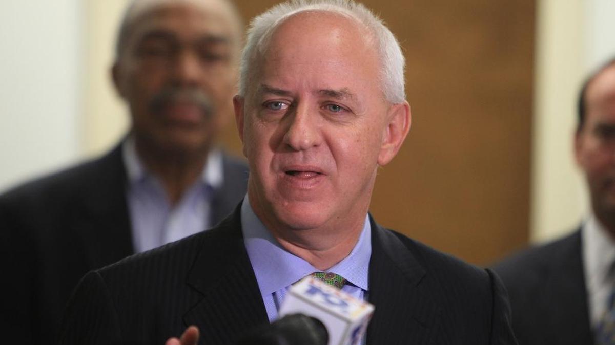 Former Democratic Gov. Jim Hodges speaks during an event inside the lobby at Columbia City Hall.