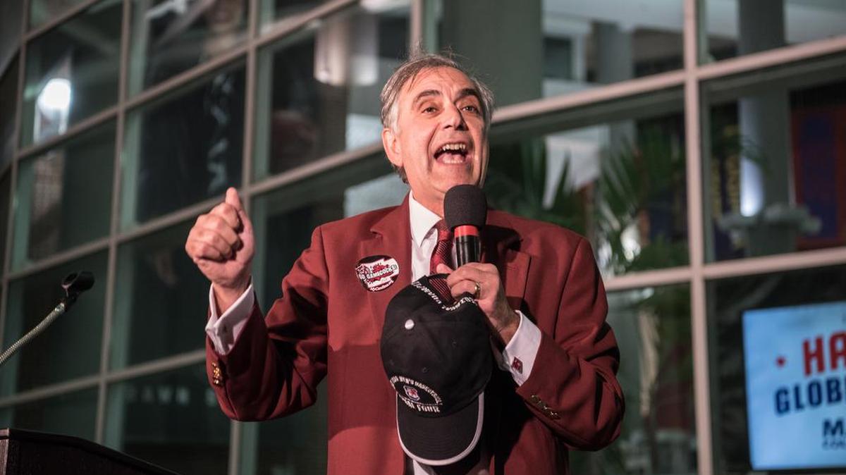 FILE: USC president Harris Pastides fires up the crowd before the homecoming of the Gamecocks basketball team after their big NCAA win over Florida.