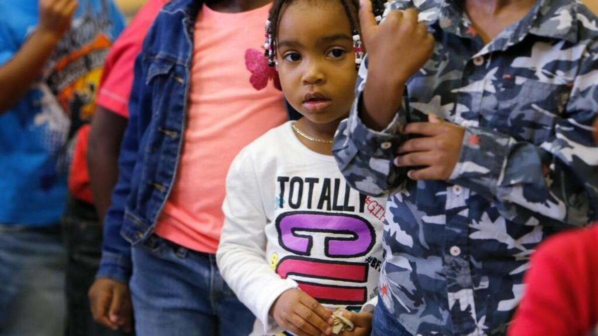 
Graceland Thomas, 3, waits in line to go back to class after lunch Tuesday at Head Start in Rock Hill. 
