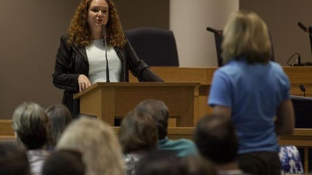 Concerned citizens ask questions of Dr. Beverly Buscemi, Director of The S.C. Department of Disabilities and Special Needs, left, addresses questions about the restructuring of the the Greenville County Disabilities Board during a meeting at Greenville County Council.
