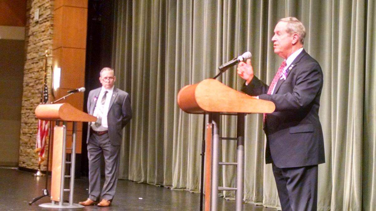 Democratic candidate Sean Carrigan, left, and Republican U.S. Rep. Joe Wilson speak at a debate organized by students at River Bluff High School on Oct. 30, 2018.