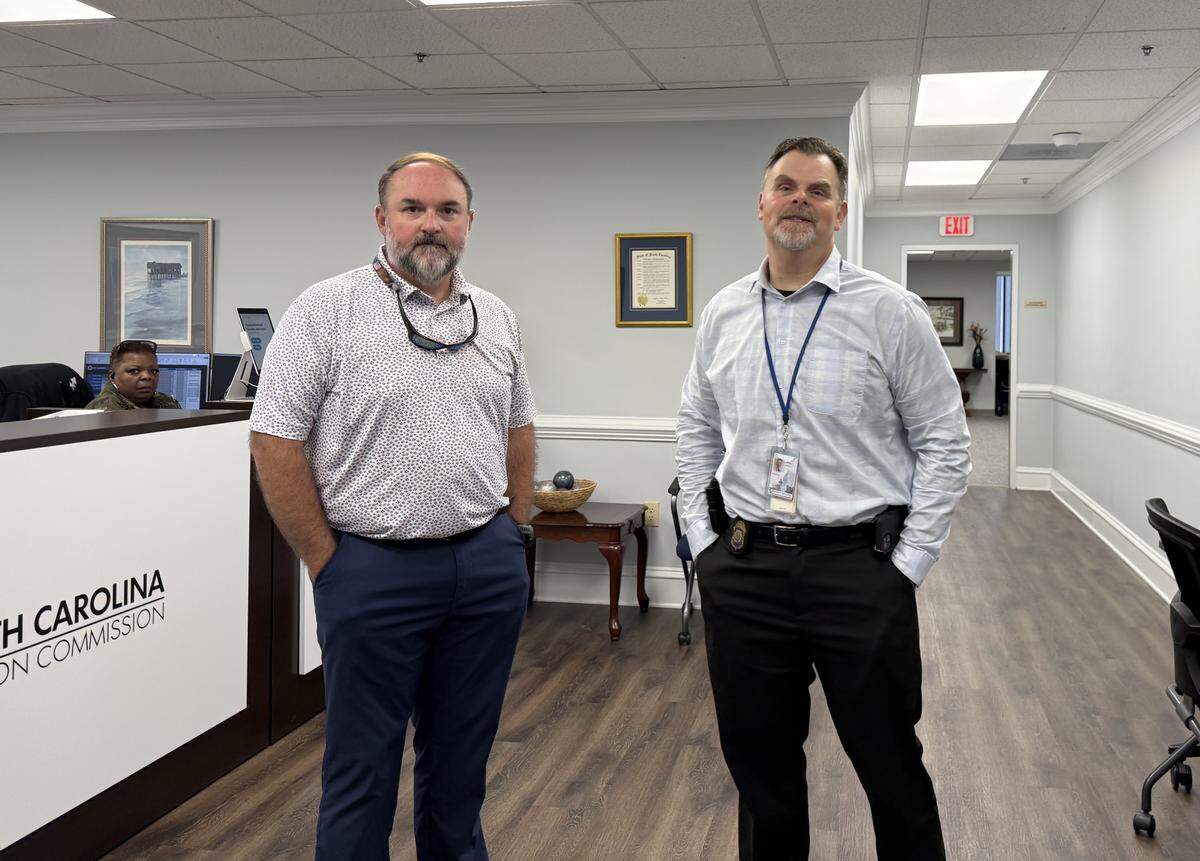Two State Law Enforcement Division agents, Matt Downey and Jeremy Smith, were at the State Election Commission office on Lady Street in downtown Columbia on Thursday. SLED found a voice-activated digital recorder at the office, sources told The State.