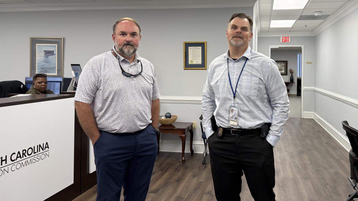 Two State Law Enforcement Division agents, Capt. Matt Downey (l) and Capt. Jeremy Smith, were at the State Election Commission office on Lady Street in downtown Columbia, S.C., on Thursday, Sept. 18, 2025. SLED has been investigating former elections Executive Director Howard Knapp for alleged misconduct.