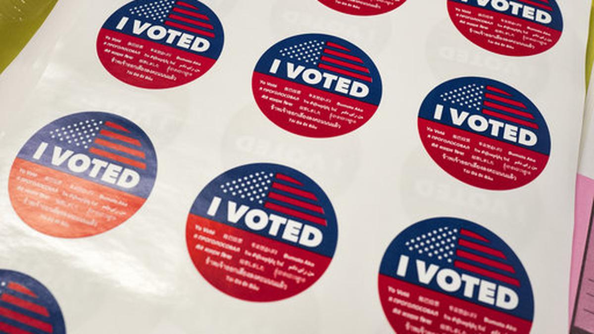 "I Voted" stickers wait for voters at a polling station inside the library at Robert F. Kennedy Elementary School in Los Angeles on Tuesday, June 5, 2018.   Voters are casting ballots in California's primary election, setting the stage for November races.