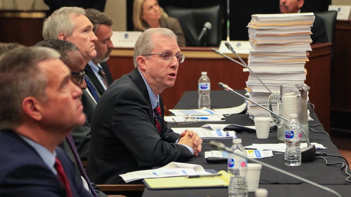 Former SCANA CEO Kevin Marsh (in center, leaning forward), testified before a S.C. House of Representatives committee investigating the company’s V.C. Summer debacle.