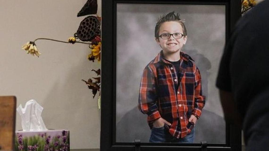 A framed photo of Jacob Hall near a box of tissues in the lobby of Oakdale Baptist Church in Townville, during Jacob’s funeral service on Oct. 4.