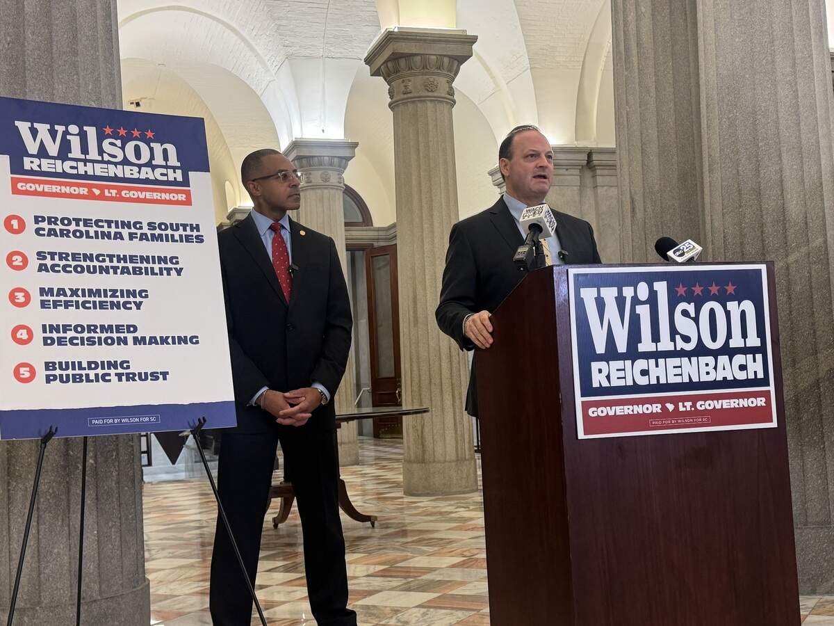 Attorney General Alan Wilson, who is running for governor, speaks about his plans for the lieutenant governor’s office while his running mate, state Sen. Mike Reichenbach, R-Florence, listens at the State House on Tuesday, Feb. 3, 2026.