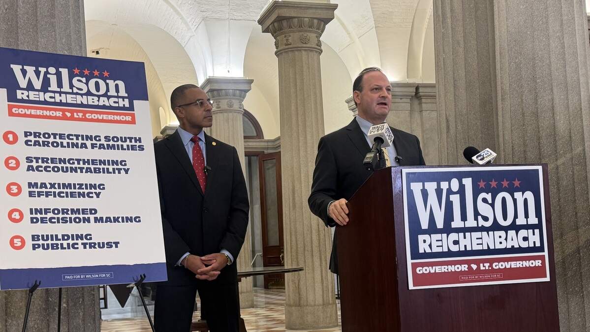 Attorney General Alan Wilson, who is running for governor, speaks about his plans for the lieutenant governor’s office while his running mate, state Sen. Mike Reichenbach, R-Florence, listens at the State House on Tuesday, Feb. 3, 2026.