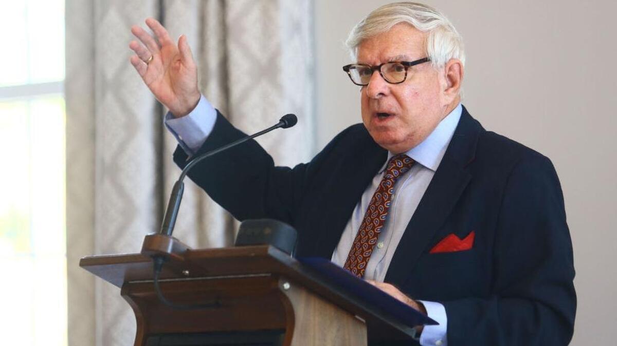 Retired Francis Marion University professor and Republican organizer Neal Thigpen discusses the presidential election with the Florence Kiwanis Club on Thursday.