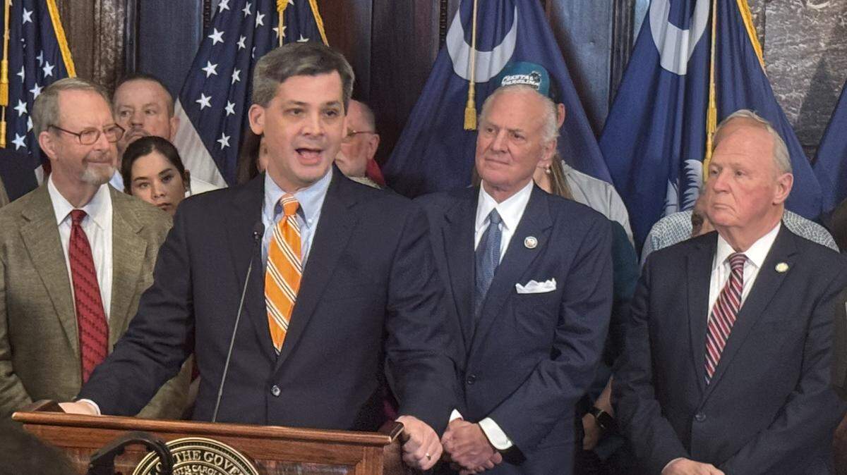 Senate Majority Leader Shane Massey speaks during a news conference on tort reform while Gov. Henry McMaster listens on Wednesday, March 5, 2025, at the South Carolina State House.