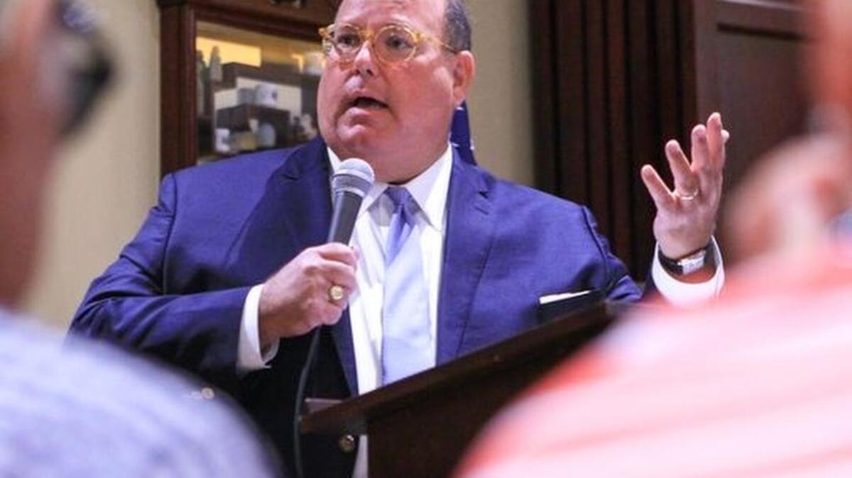 Ed McMullen, South Carolina chairman for Donald Trump, speaks to the 1st Monday Club during its meeting at Master's Wok in Anderson.