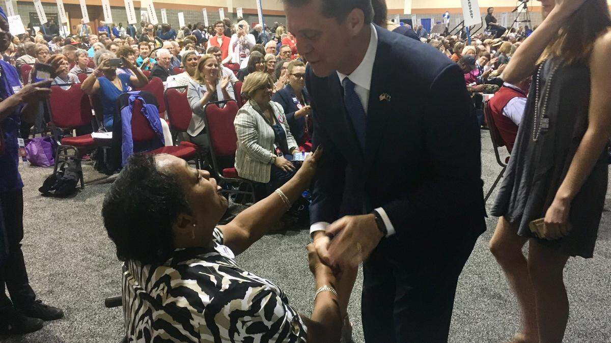 State Rep. James Smith, a Columbia Democrat running for governor in 2018, shakes hands with Pamela Brandon after giving a speech at the 2018 S.C. Democratic Party convention.