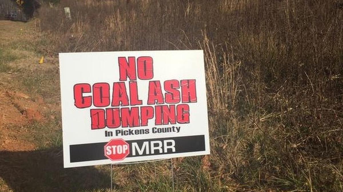 A sign posted outside a proposed coal ash landfill near Liberty
