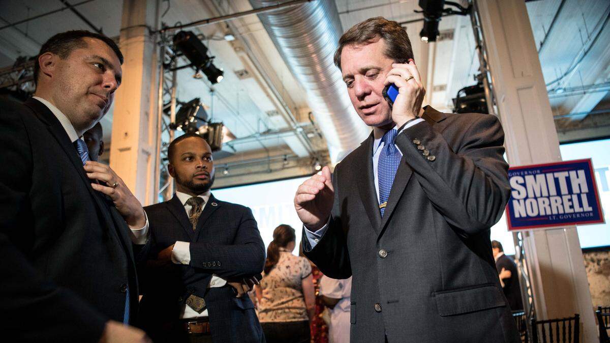 South Carolina Democratic gubernatorial candidate James Smith talks on the phone after a primary watch party at 701 Whaley on June 12, 2018, in Columbia, S.C. 