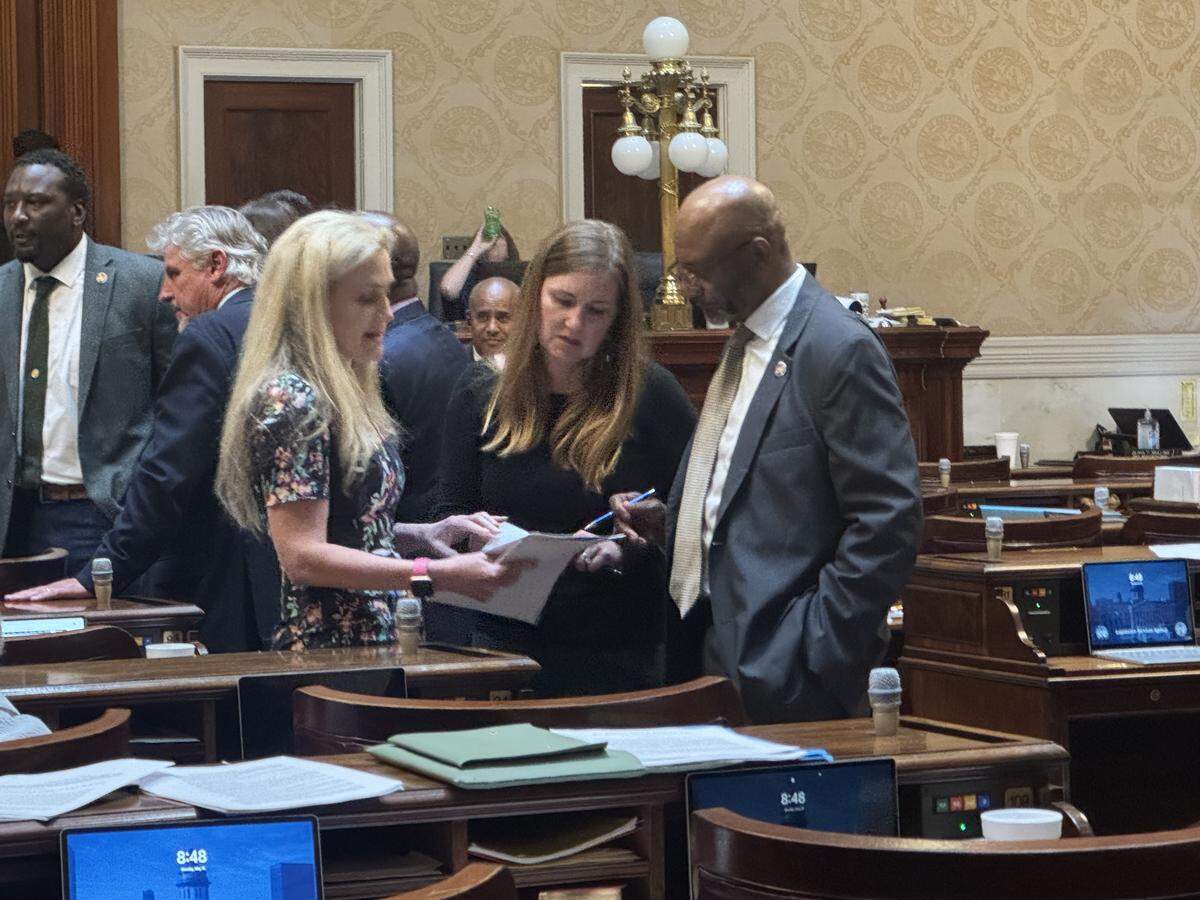 State Reps. Beth Bernstein, D-Richland, Spencer Wetmore, D-Charleston, and Robert Williams, D-Darlington, on Monday, May 18, 2026, at the South Carolina State House, discuss which amendments they will present during the congressional redistricting debate.