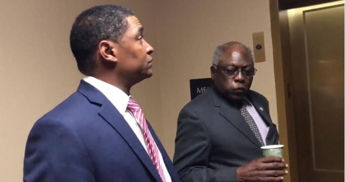 Rep. Jim Clyburn (D-S.C.), right, inside the Capitol with Congressional Black Caucus chairman Cedric Richmond (D-La.).