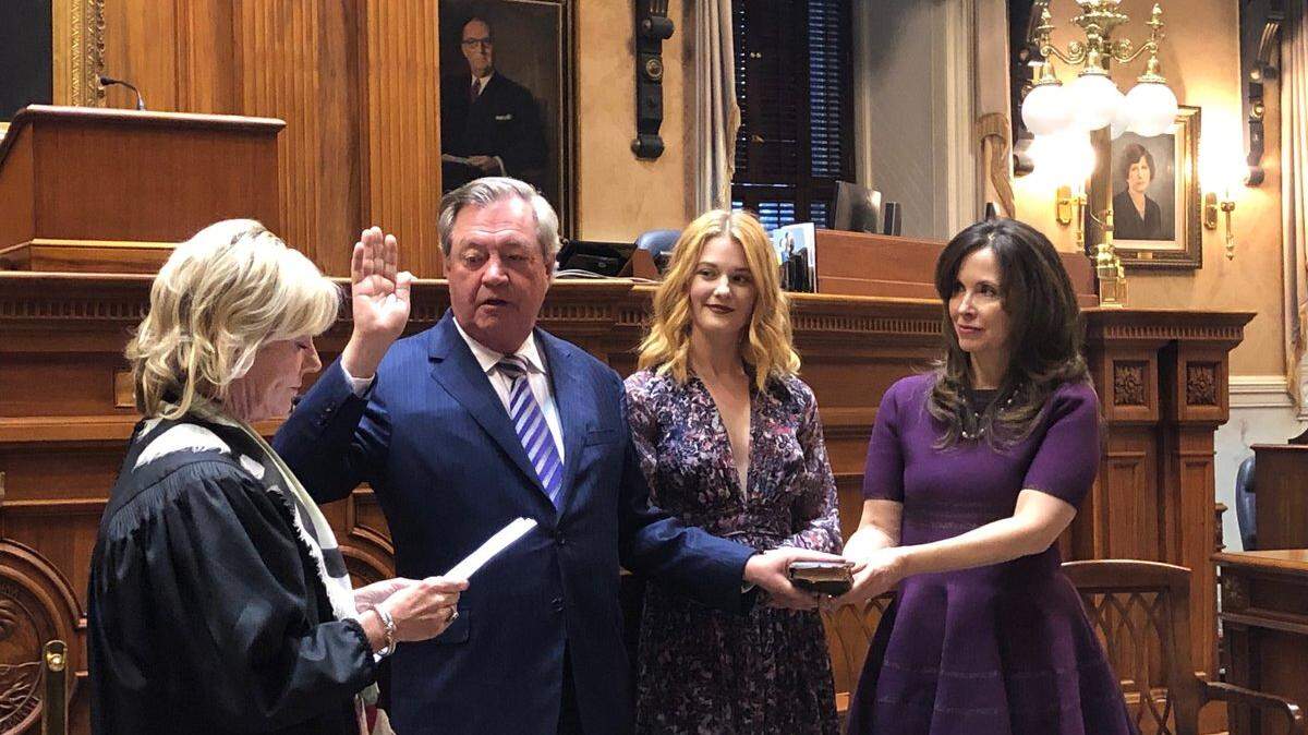 State Sen. Dick Harpootlian, D-Richland, is sworn in by U.S. Judge Mary Lewis in the S.C. Senate chamber on Nov. 14, 2018, Harpootlian was joined, from left, by his daughter Kate Harpootlian and wife Jamie Harpootlian. Jamie Harpootlian on Wednesday was nominated to be US ambassador to Slovenia.