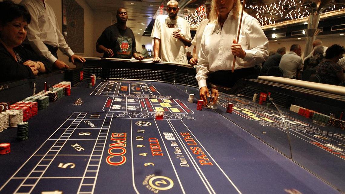 Dice bounce on the craps table on a casino boat off the coast of Horry County in 2017. In October 2024, Horry County Council passed a new law that will charge casino boats more money per customer starting in 2025. 