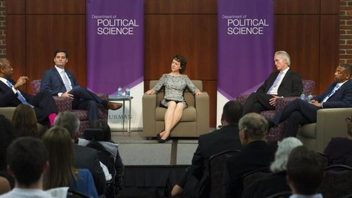 Political science professor Danielle Vinson moderates a forum between U.S. Representative Trey Gowdy, Democratic challenger Chris Fedalei, U.S. Senator Tim Scott and Democratic challenger Thomas Dixon at Furman University on Monday, Oct. 24, 2016.