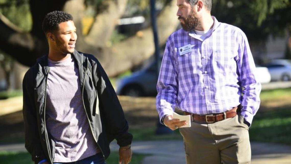 Kendeveon Stenhouse, a sophomore at Spartanburg Methodist College, left, and Chris Roberson, director of financial aid at SMC, talk about the changes to the Pell grant system proposed by U.S. Rep. Ralph Norman, R-Rock Hill.