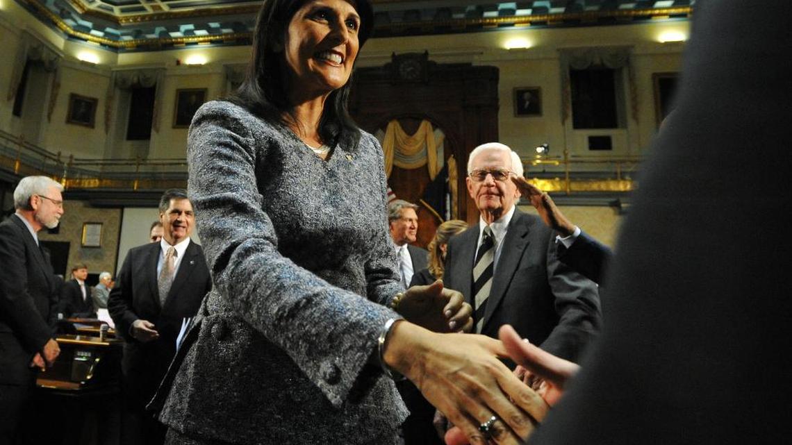 South Carolina Gov. Nikki Haley is greeted by members of the House after delivering her State of the State address to the joint session of the legislature on Wednesday, Jan. 22, 2014 at the Statehouse in Columbia, S.C.