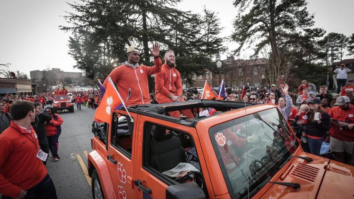 Deshaun Watson and Ben Boulware ride down SC 93 towards Memorial Stadium. The Clemson football team paraded down the street of Clemson, South Carolina, on Saturday, January 14, 2017 after defeating the University of Alabama in the college football playoff championship game.