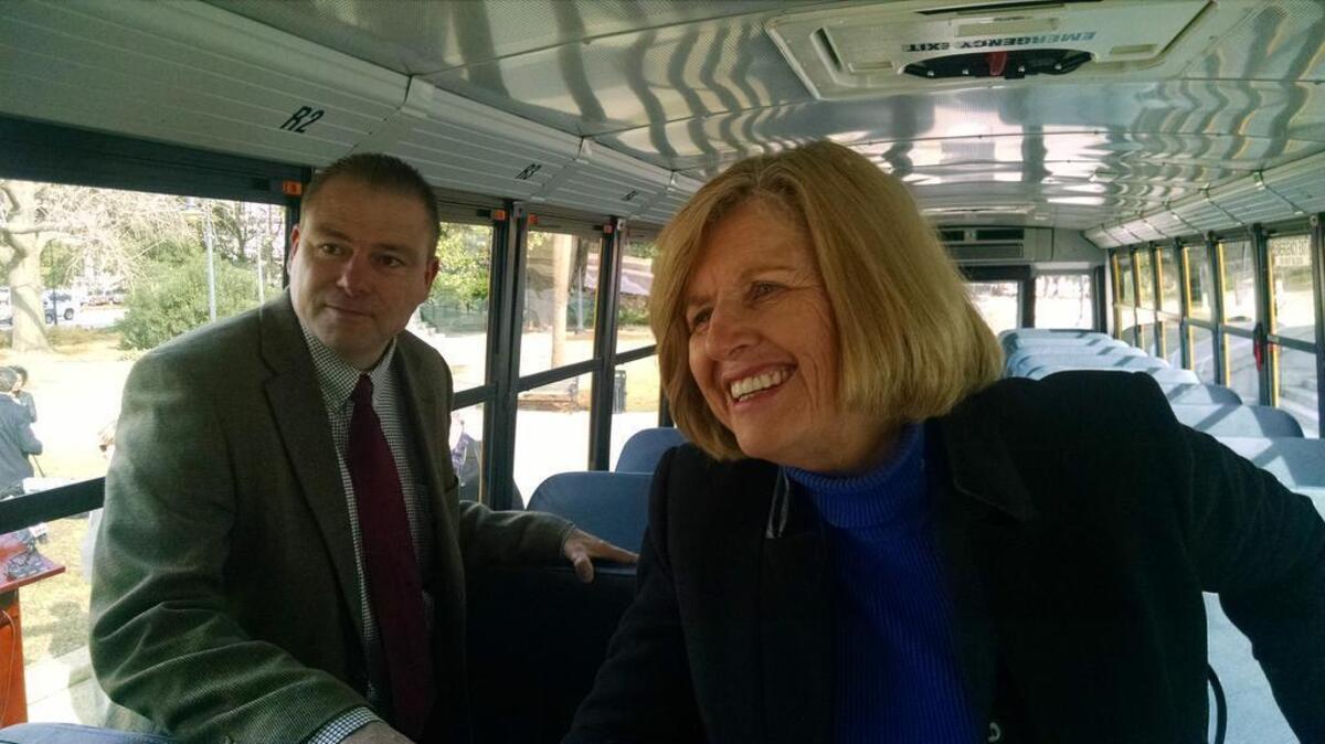 S.C. Education Superintendent Molly Spearman stands in the aisle of a 2016 South Carolina school bus, alongside Tim Camp, transportation director for the S.C. Department of Education.