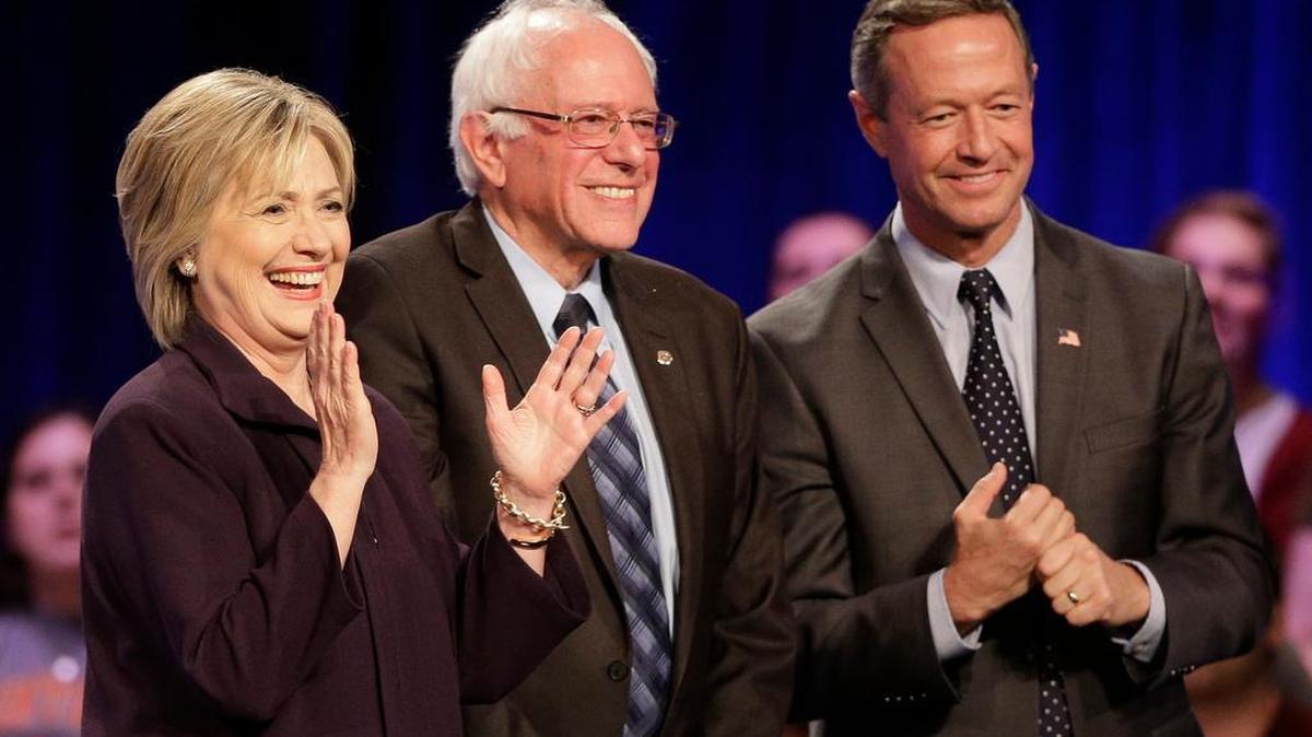 Democratic presidential candidates Hillary Rodham Clinton, left, former Maryland Gov. Martin O'Malley, right, and Sen. Bernie Sanders, I-Vt, center, smile after a democratic presidential candidate forum at Winthrop University in Rock Hill, S.C., Friday, Nov. 6, 2015.