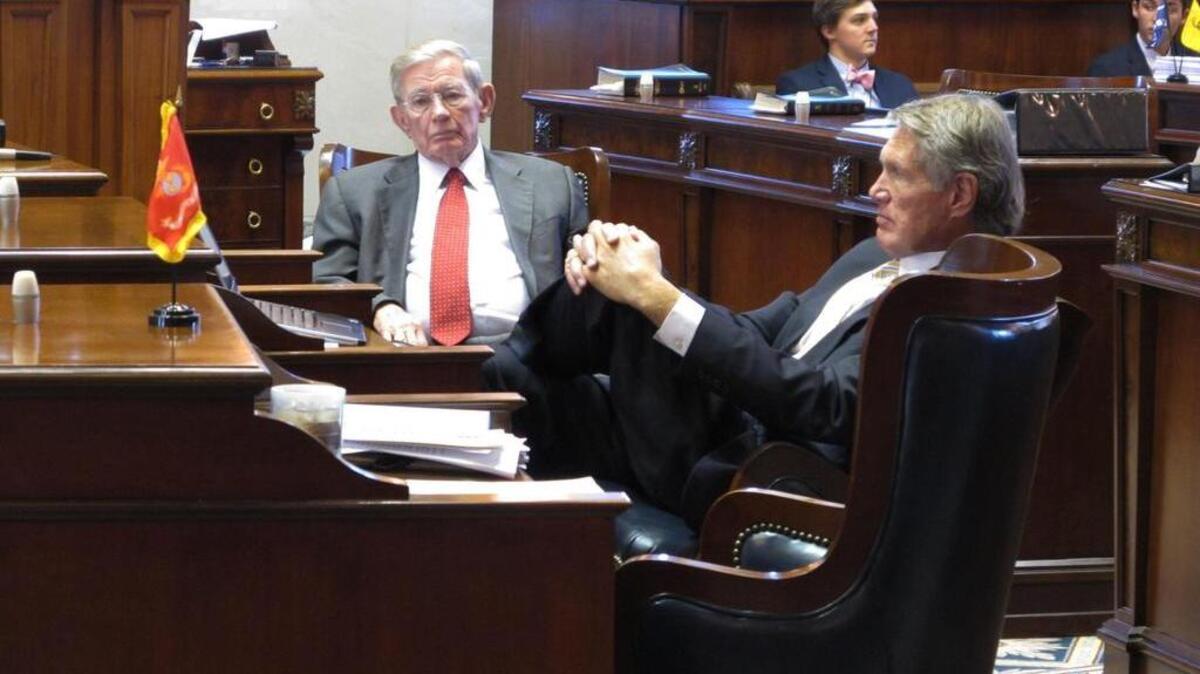 South Carolina Sen. Hugh Leatherman, R-Florence, left, and Sen. Harvey Peeler, R-Gaffney, right, listen to a filibuster on a roads bill in the state Senate chamber on Wednesday, March 2, 2016, in Columbia, S.C.
