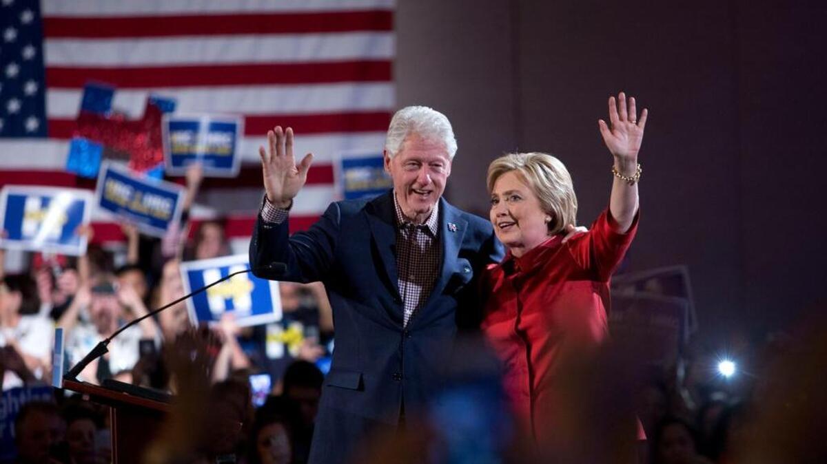 Former President Bill Clinton and Democratic presidential candidate Hillary Clinton wave after Hillary Clinton's victory speech for the Nevada caucuses at Caesars Palace in Las Vegas on Saturday, Feb. 20, 2016. Clinton edged out Bernie Sanders on Saturday in Nevada's Democratic caucuses, capitalizing on a more diverse Democratic electorate to propel her to a critical win and give her momentum as the presidential campaign shifts toward the South.