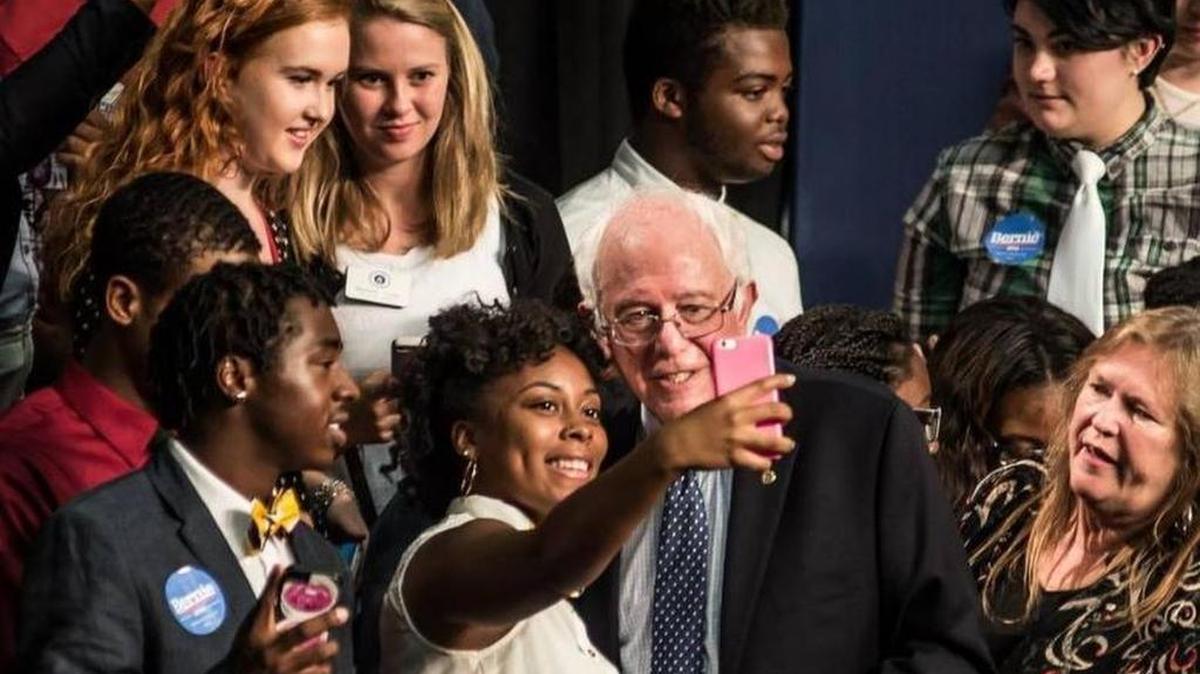 
Democratic presidential candidate U.S. Sen. Bernie Sanders poses for photos with freshman Saja Hargrow at a college town hall at Benedict College this month.

