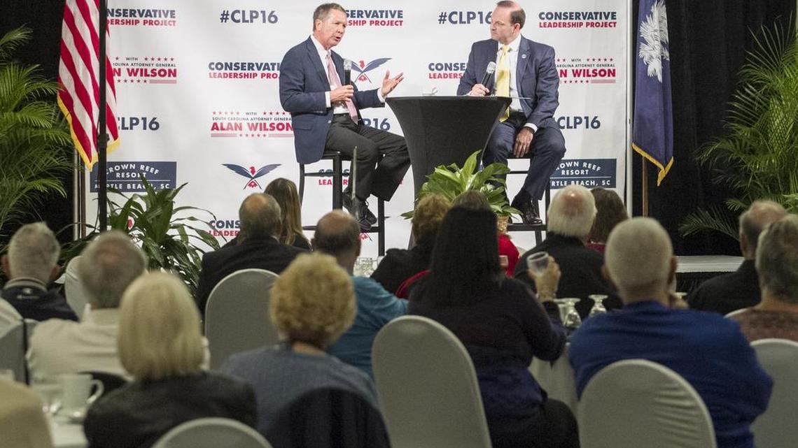 Presidential candidate and Ohio governor John Kasich answers questions from S.C. Attorney General Alan Wilson and from the audience at the Conservative Leadership Project event at The Crown Reef Resort in Myrtle Beach on Tuesday.