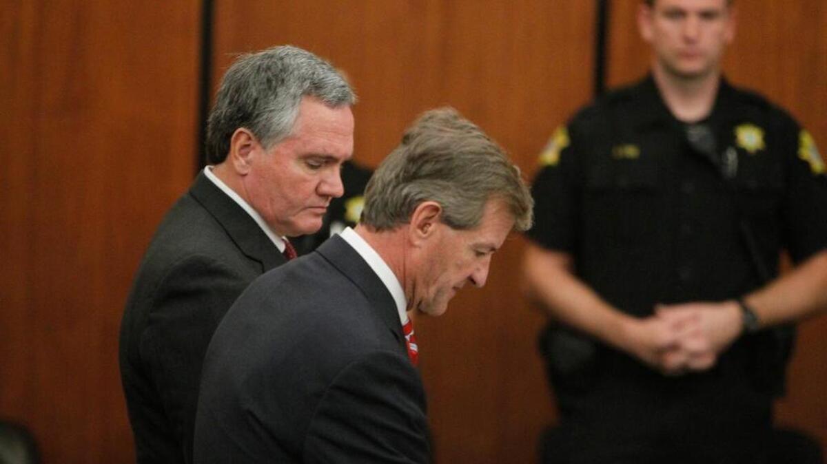 
Bobby Harrell, then-speaker of the S.C. House, look at his lawyer Bart Daniel as he pleads guilty to six counts of use of campaign funds for personal expenses in October.

