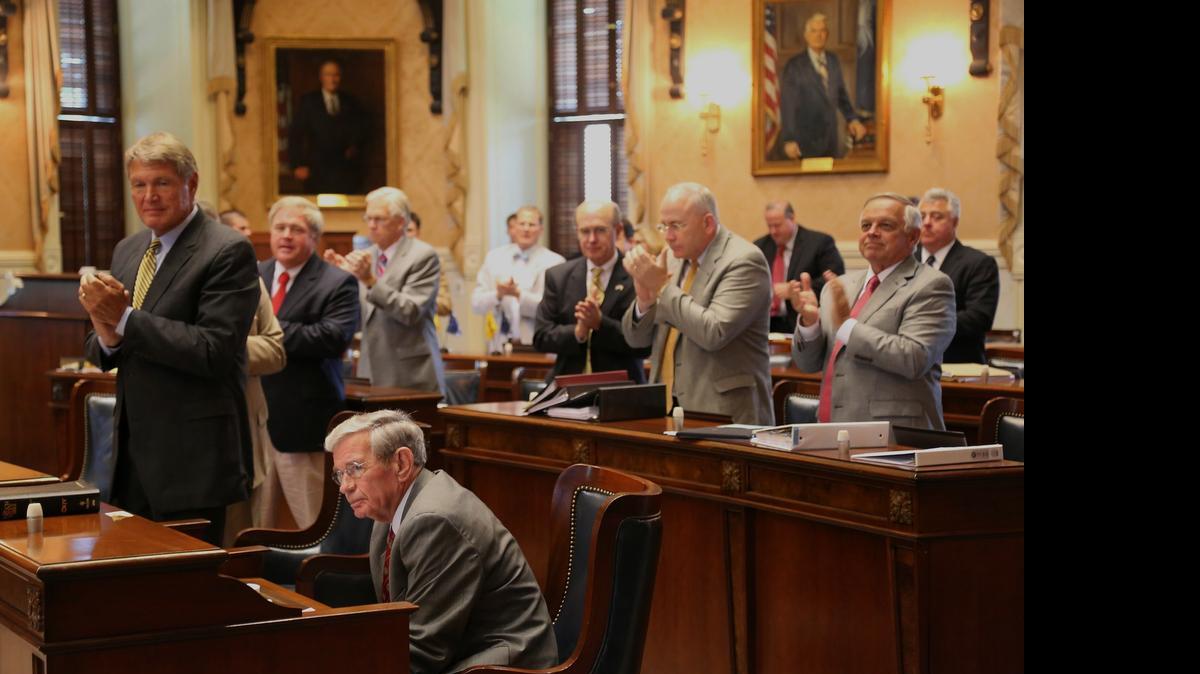 
Senate MajorityLeadaer Harvey Peeler, R-Cherokee, (left) stands and applauds after Senate Finance Chairman Hugh Leatherman, R-Florence, (seated) was elected Senate President Pro Tempore a year ago.
