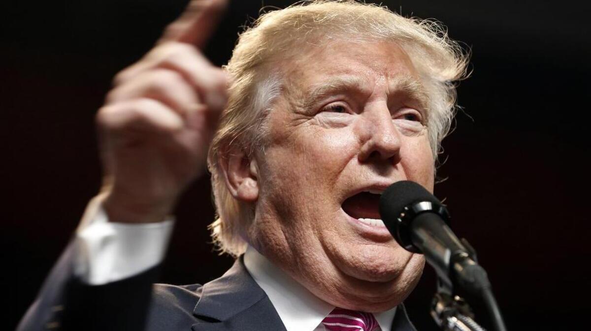 FILE - In this May 5, 2016 file photo Republican presidential candidate Donald Trump gestures during a rally in Charleston, W.Va. Trump's apparent lock on the Republican presidential nomination means advocates of large-scale transfers of federal lands to states in the West likely won't find support in the White House regardless of who wins election this November.