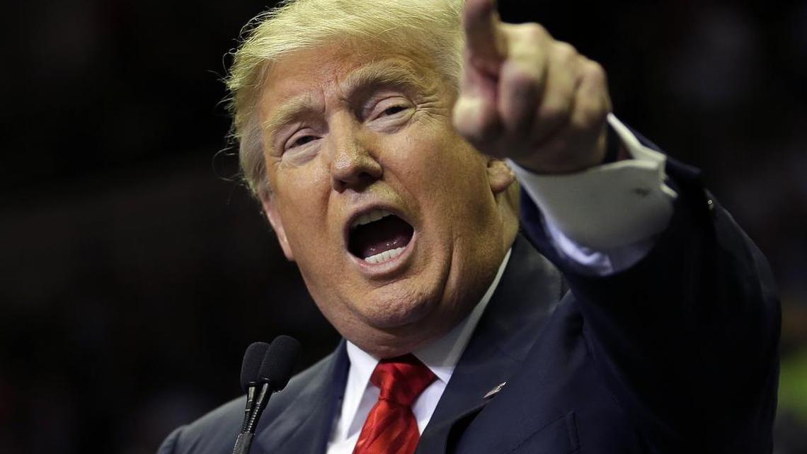 Republican presidential candidate Donald Trump gestures to supporters during a rally Friday in Tampa, Fla.