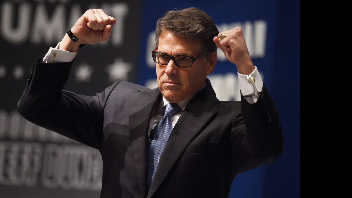 
Texas Gov. Rick Perry speaks at the Freedom Summit Saturday in Greenville. Several hundred Republican activists are gathered to hear from almost a dozen declared and potential presidential candidates. 
