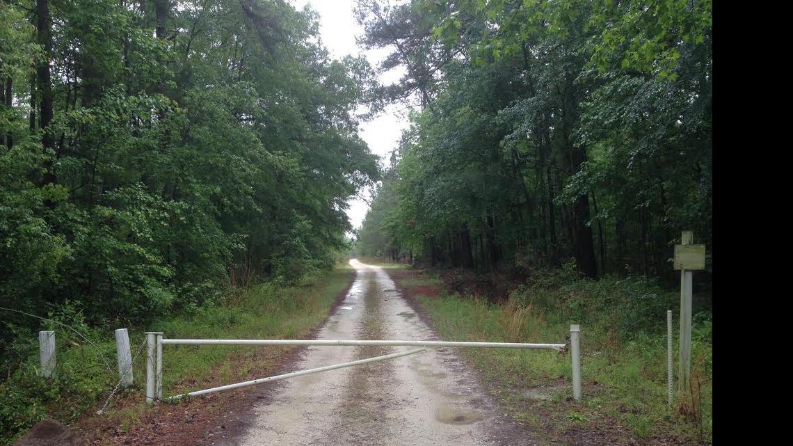 
The gate at the main entrance to Camp Hall, an old timber plantation that could be the site of Volvo’s first American manufacturing plant.
