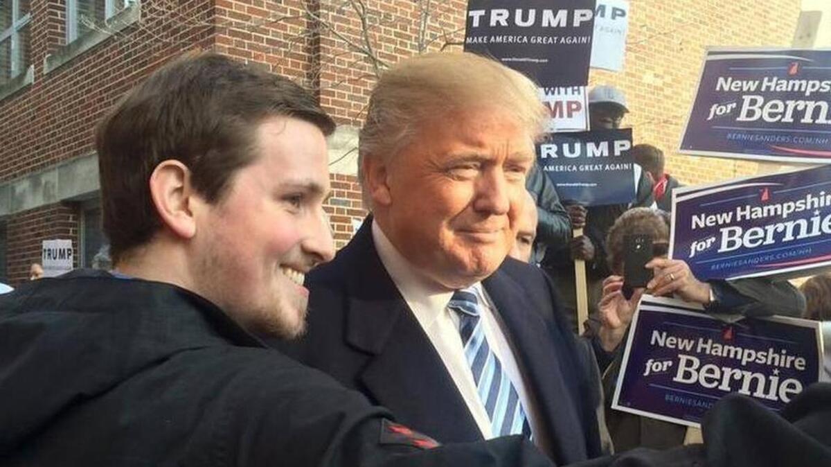 Donald Trumps poses for a photo at Webster Elementary School in Manchester, N.H., Tuesday, Feb. 9, 2016.