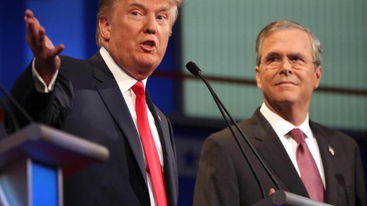 
Republican presidential candidates Donald Trump and Jeb Bush participate in the first Republican presidential debate at the Quicken Loans Arena in Cleveland in August.
