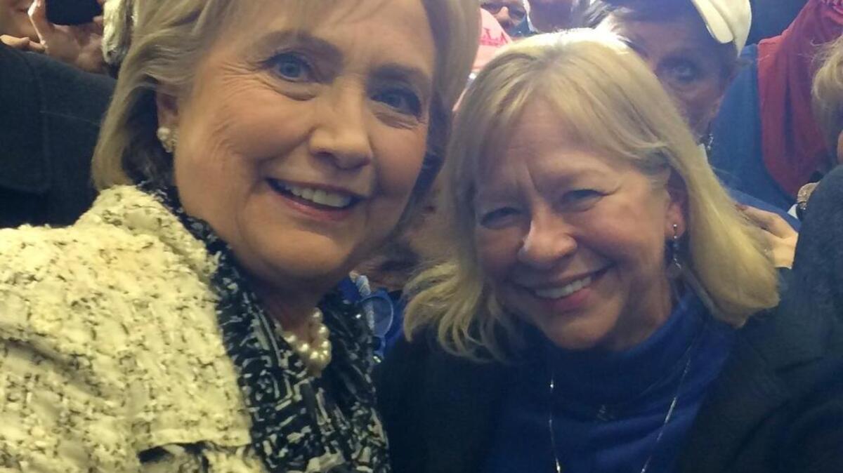 Kaye Koonce celebrated with Hillary Clinton after Clinton won the 2016 Demoratic presidential primary in February.