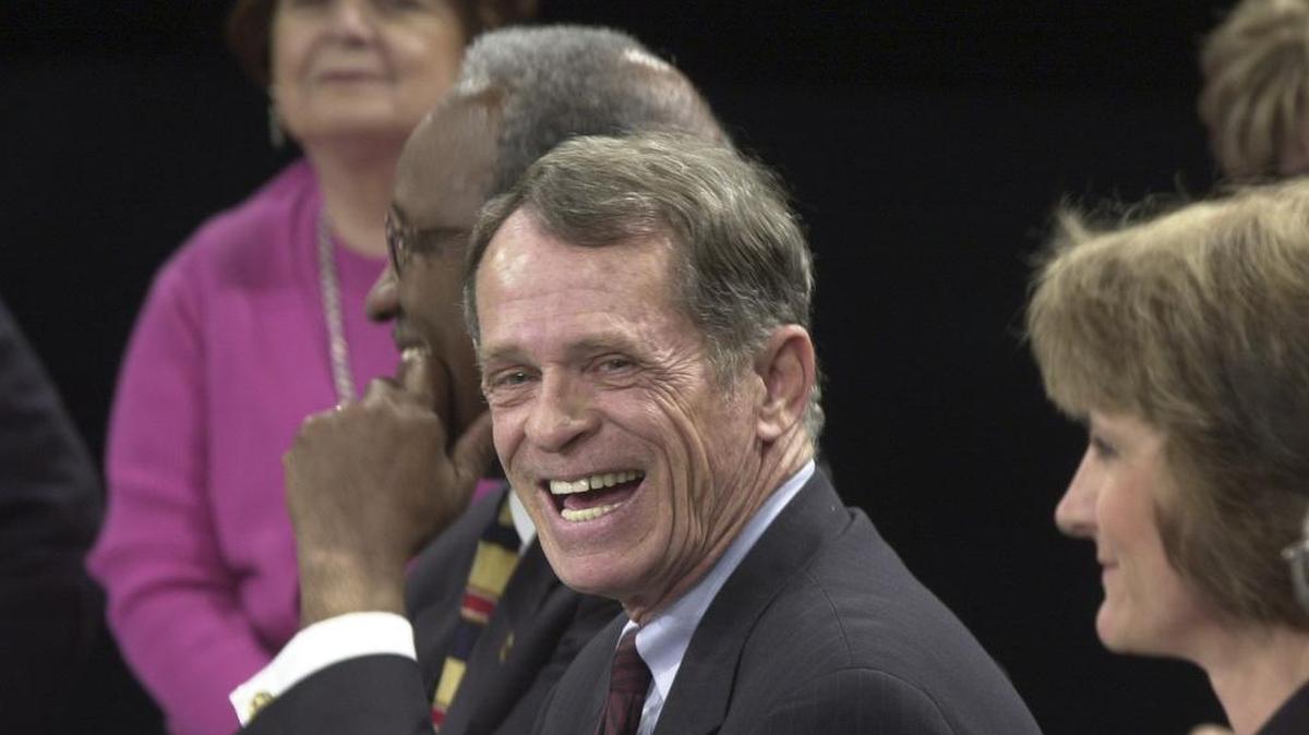 Representative Bill Cotty, center, listens to comments from ETV audience members during a panel discussion on May 18, 2005.